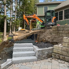 Granite-and-Paver-Hardscape-Design-with-Retaining-and-Sitting-Walls 3